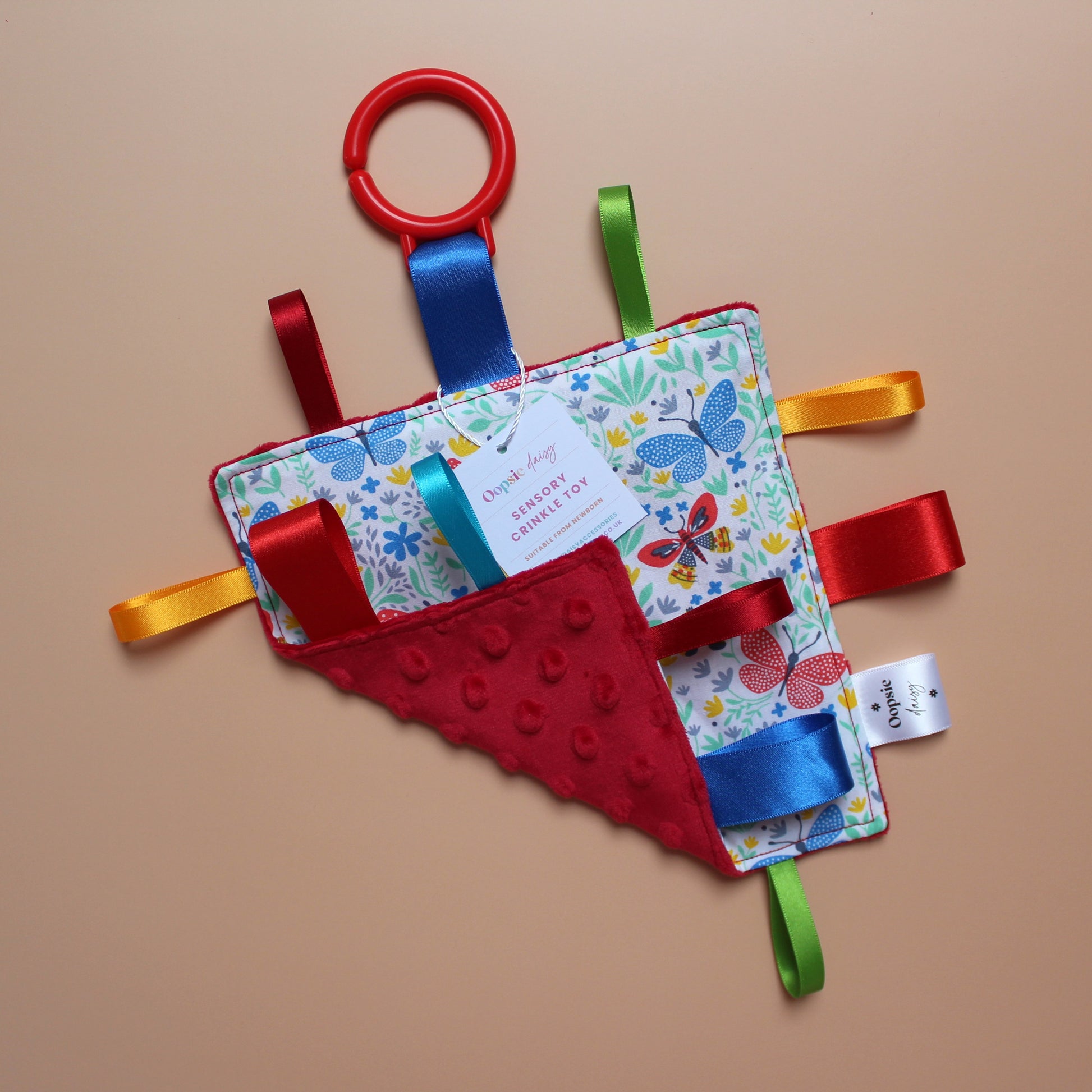 Sensory crinkle tag baby toy with butterfly pattern