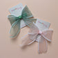 Pink and green organza hair bows with pearls