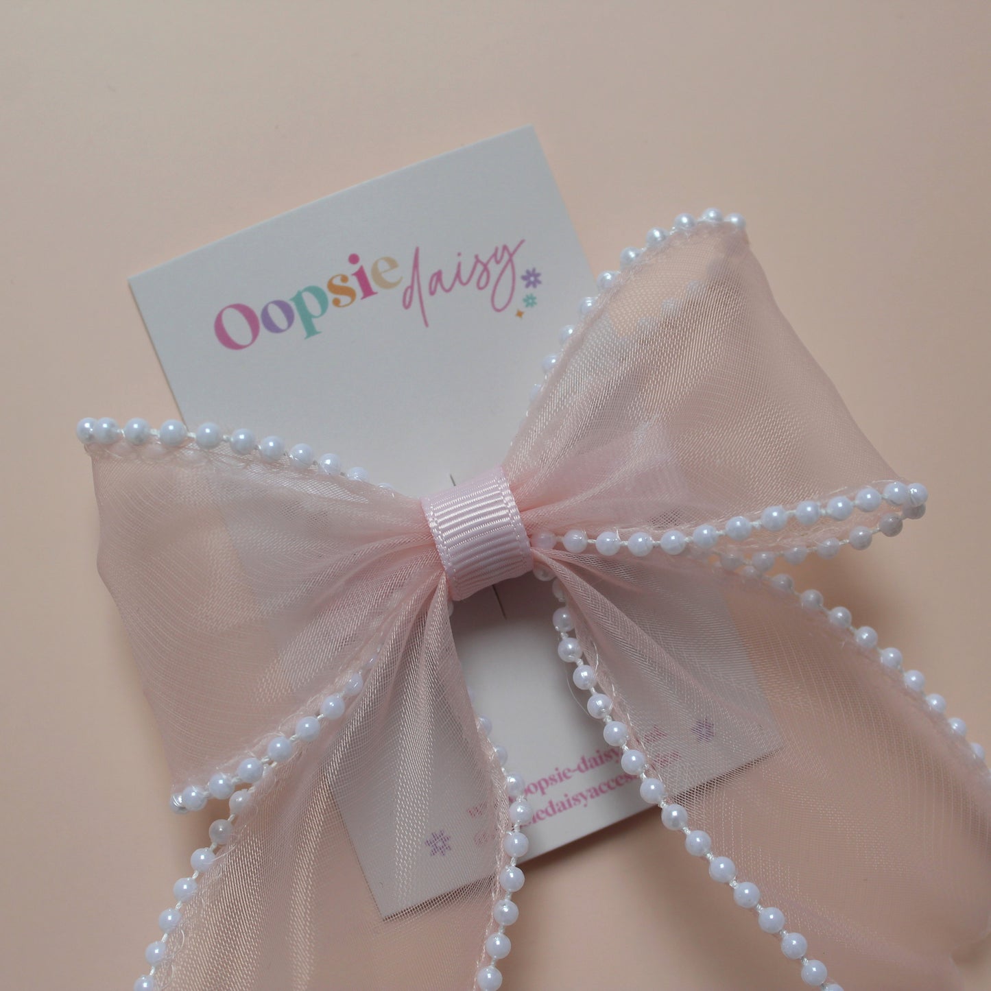 Light pink organza hair bow with pearls