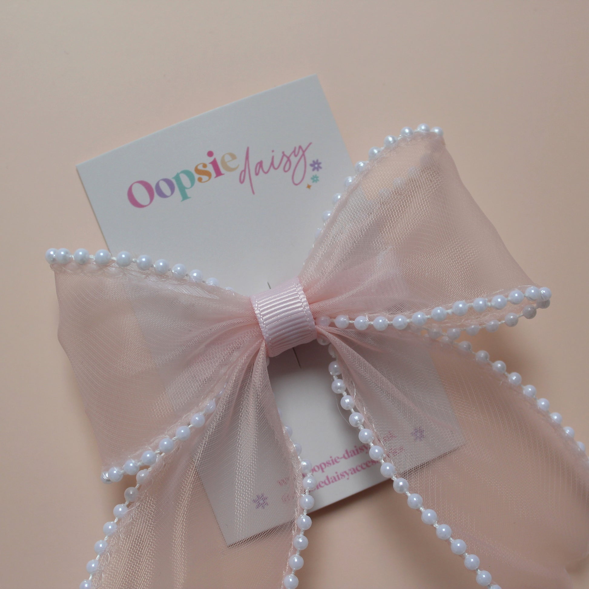 Light pink organza hair bow with pearls