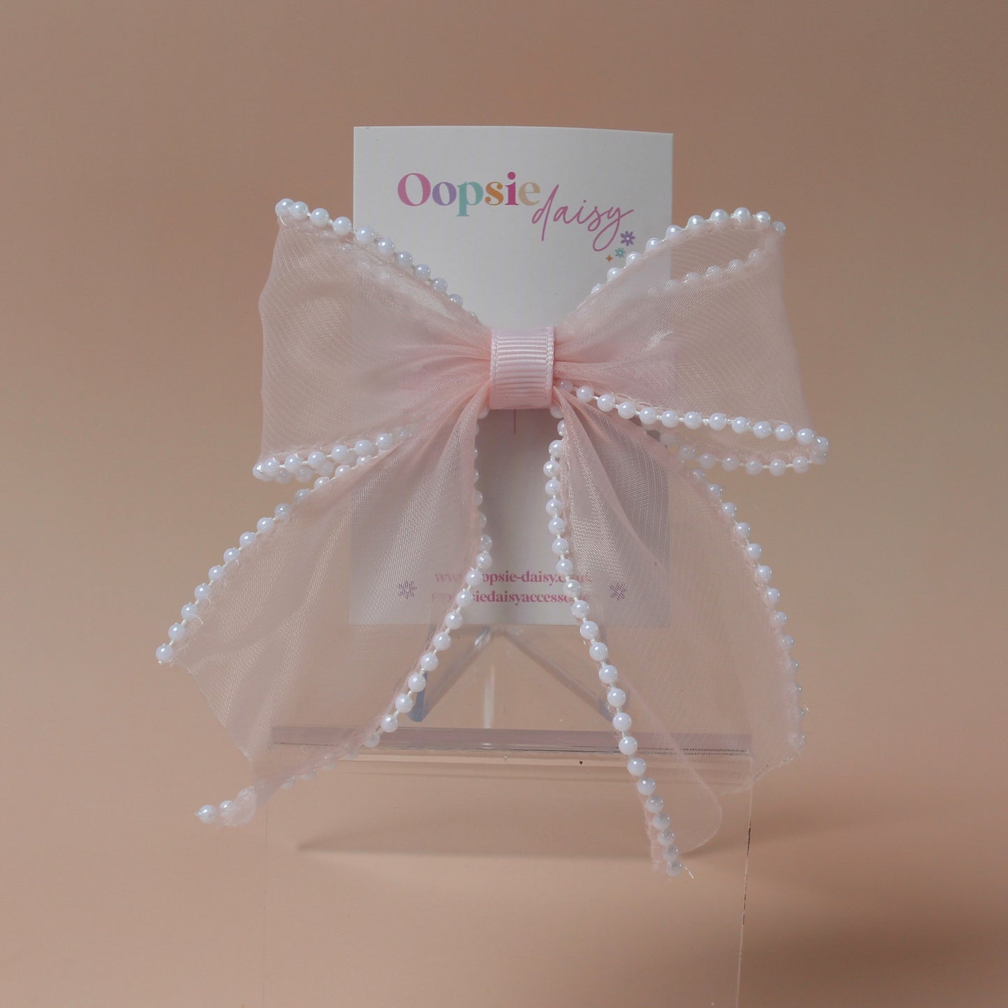Light pink organza hair bow with pearls