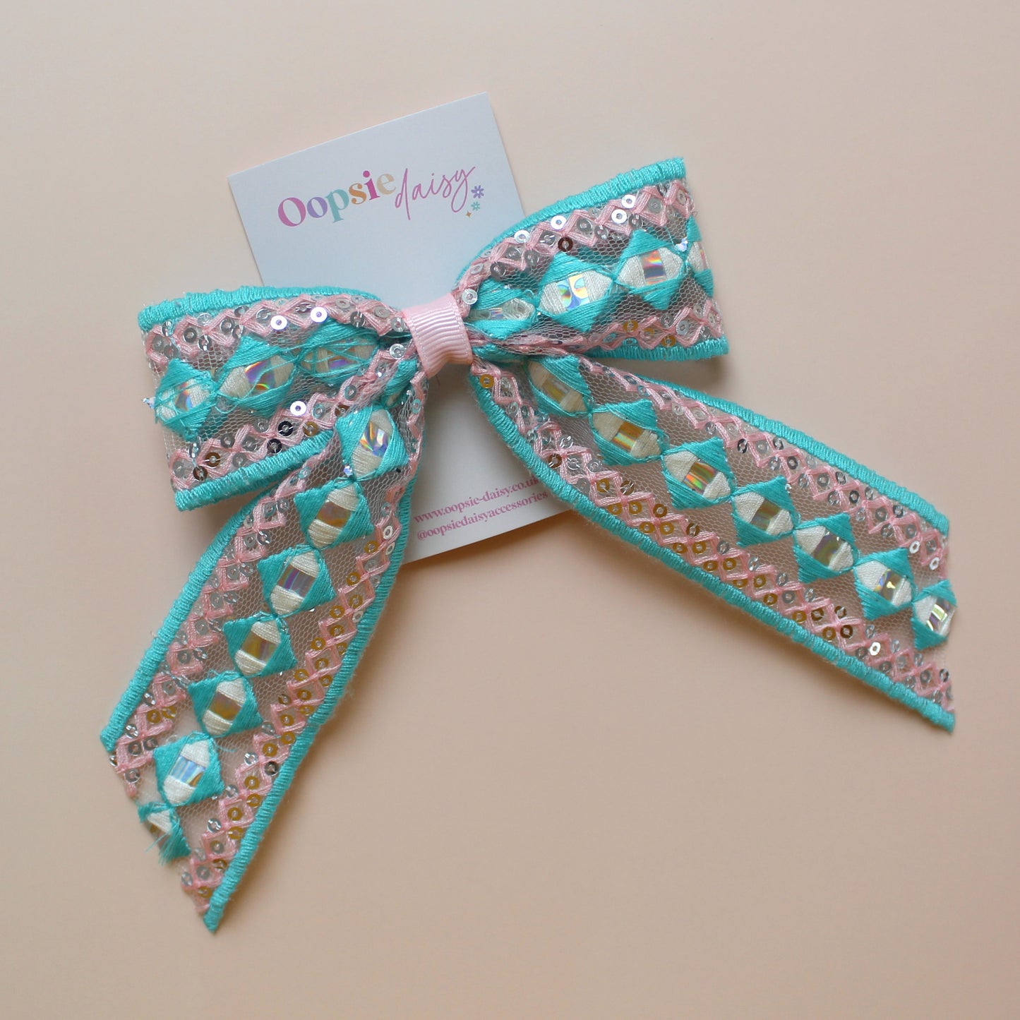 Pink & turquoise hair bow with silver sequins