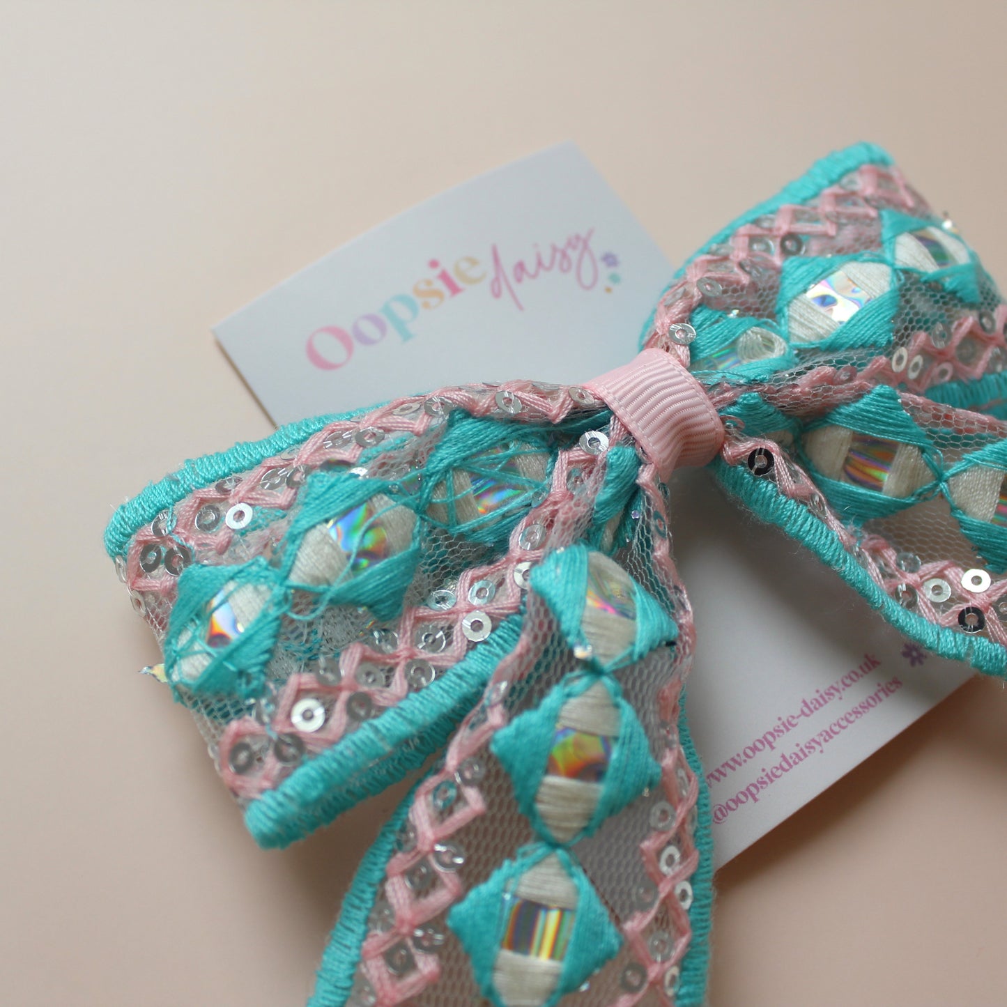 Pink & turquoise hair bow with silver sequins