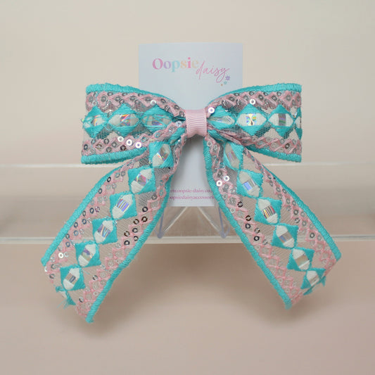 Pink & turquoise hair bow with silver sequins